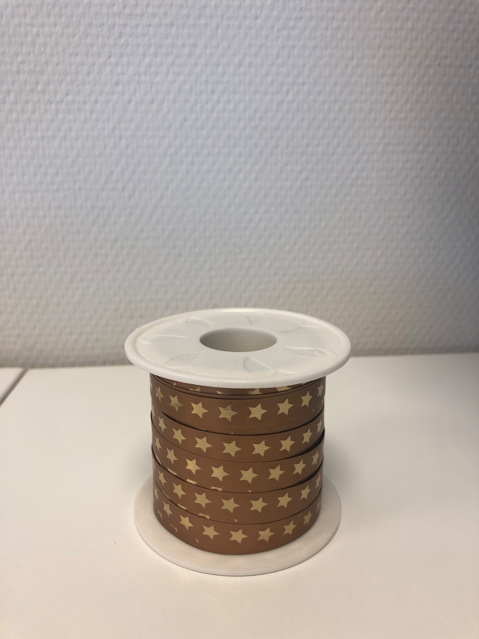 Krullint Christmas star goud
